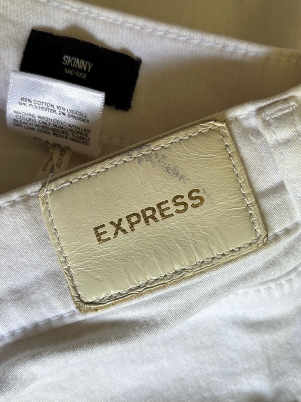 Express Skinny Mid Rise Cotton Stretch Jeans - Picture 8 of 9
